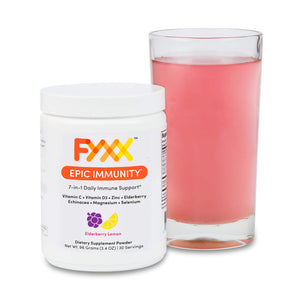 
                  
                    A jar of FYXX Epic Immunity dietary supplement powder sits next to a mixed and ready-to-drink glass. The berry lemonade flavor can be seen in the bright pink color of the drink.
                  
                